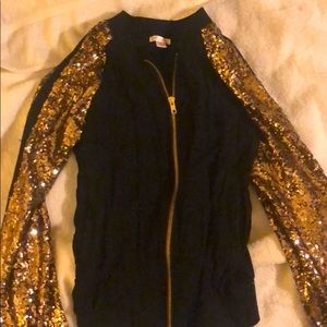 Gold sleeved black zip up